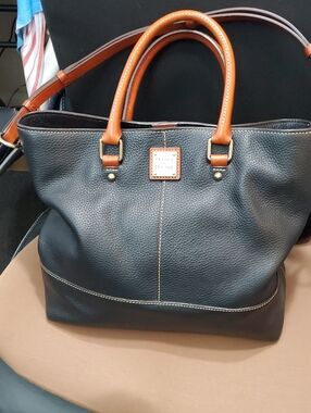 Dooney & Bourke Chelsea Shopper Slate Tote with Brown Trim and Handles.